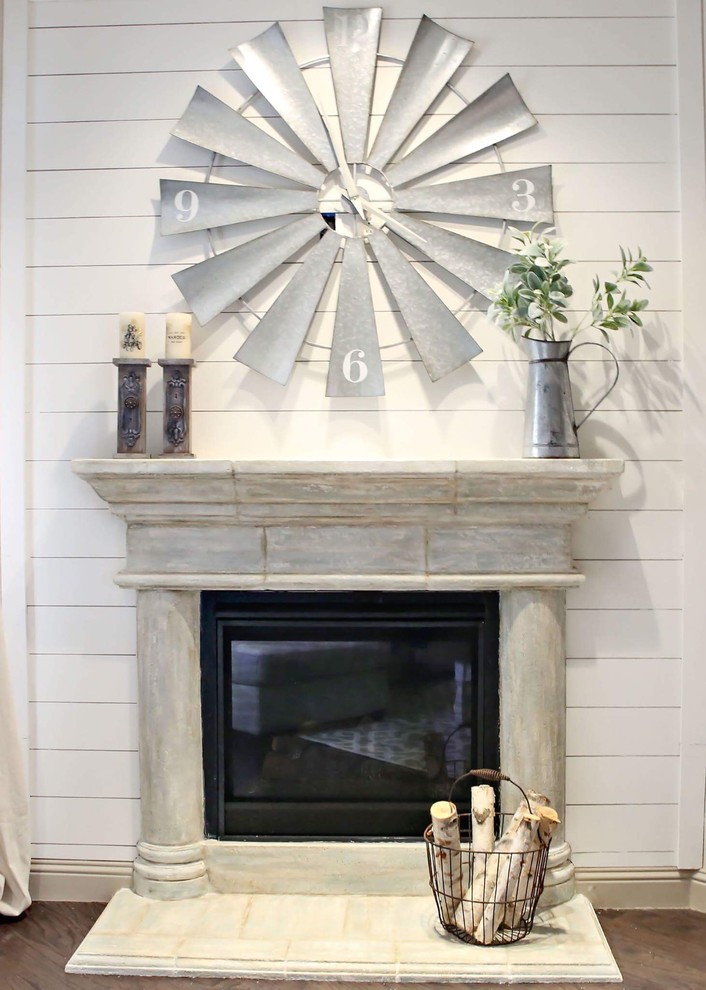 Inspiration for a mid-sized country open concept living room remodel in Dallas with a tv stand and white walls