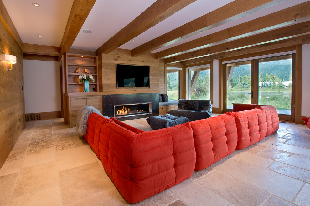 Rustic living room in Vancouver with white walls, a ribbon fireplace and a wall mounted tv.