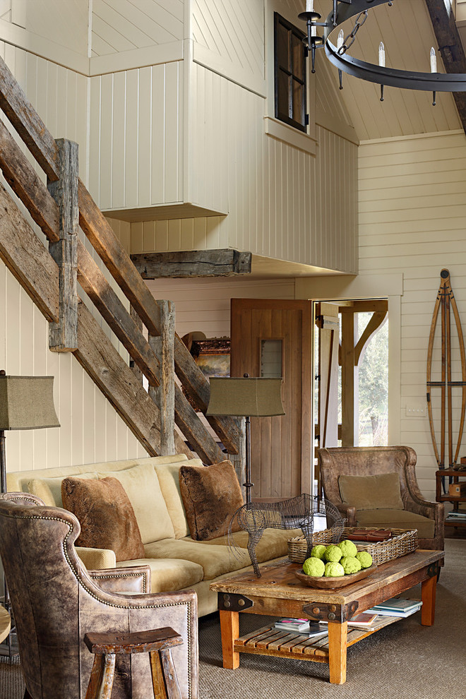 Inspiration for a rustic living room remodel in Birmingham with beige walls