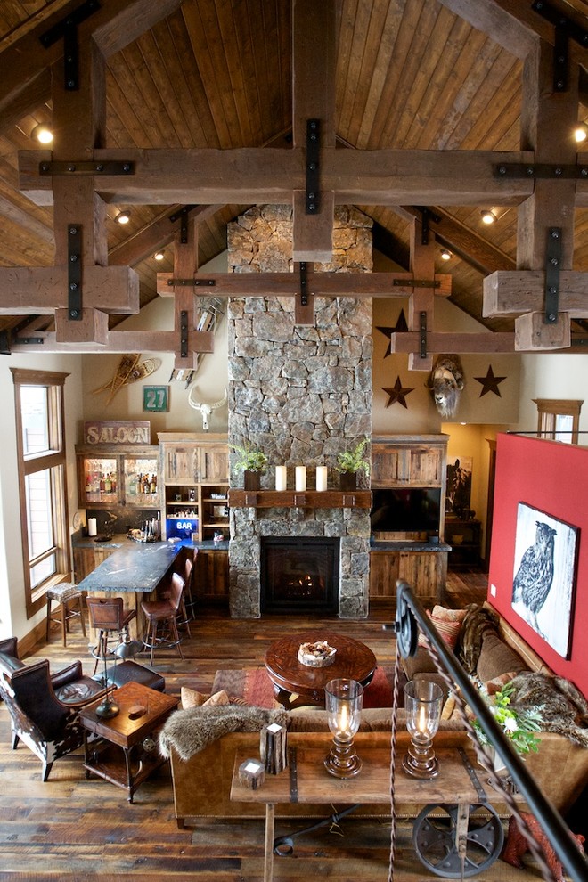 Photo of a rustic open plan living room in Boise.