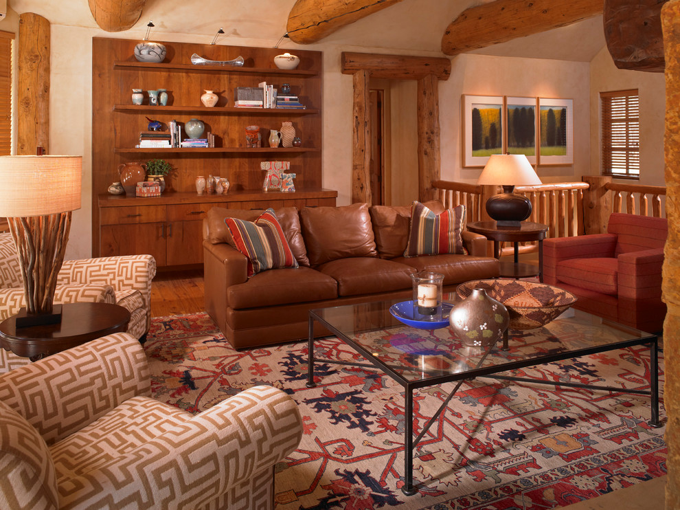 Design ideas for a large rustic formal mezzanine living room in Denver with beige walls, no tv, carpet and multi-coloured floors.