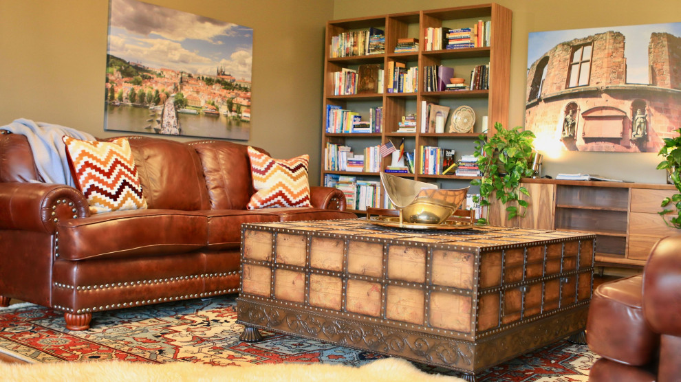 Esempio di un soggiorno chic di medie dimensioni e aperto con libreria, pareti blu, pavimento in legno massello medio, stufa a legna e pavimento marrone