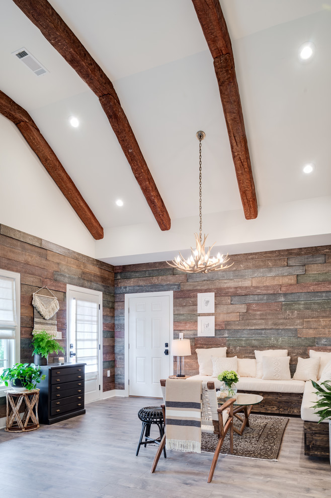 Inspiration for a mid-sized transitional formal and open concept light wood floor and gray floor living room remodel in Atlanta with brown walls, no fireplace and no tv