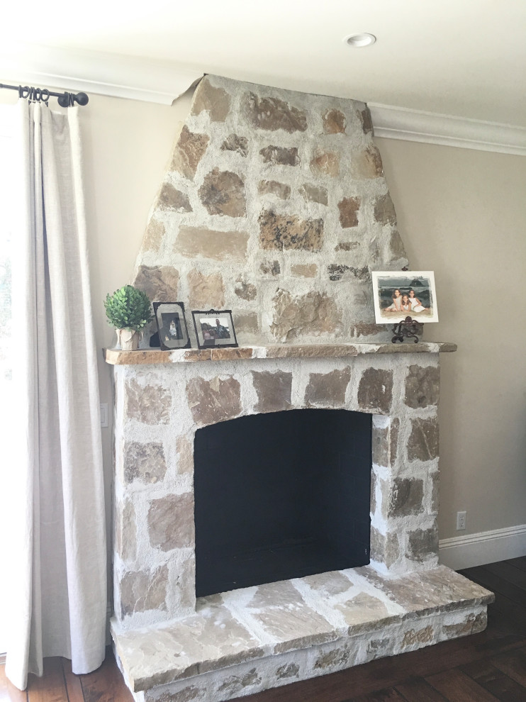 rustic stone fireplace Farmhouse Living Room Orange County by