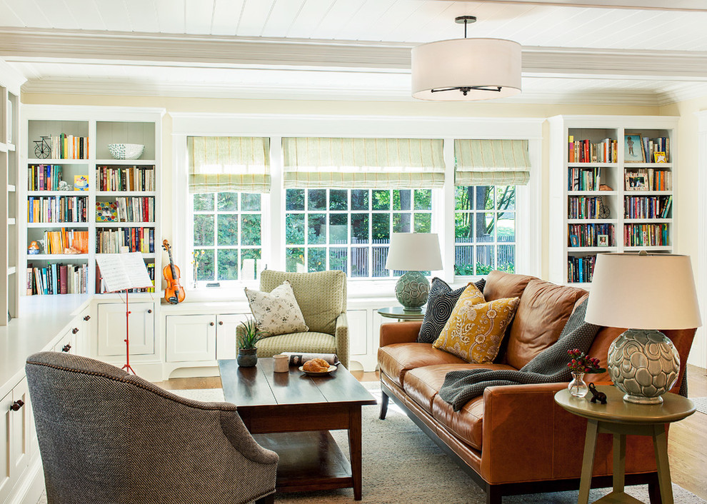 Inspiration for a timeless living room remodel in New York with beige walls