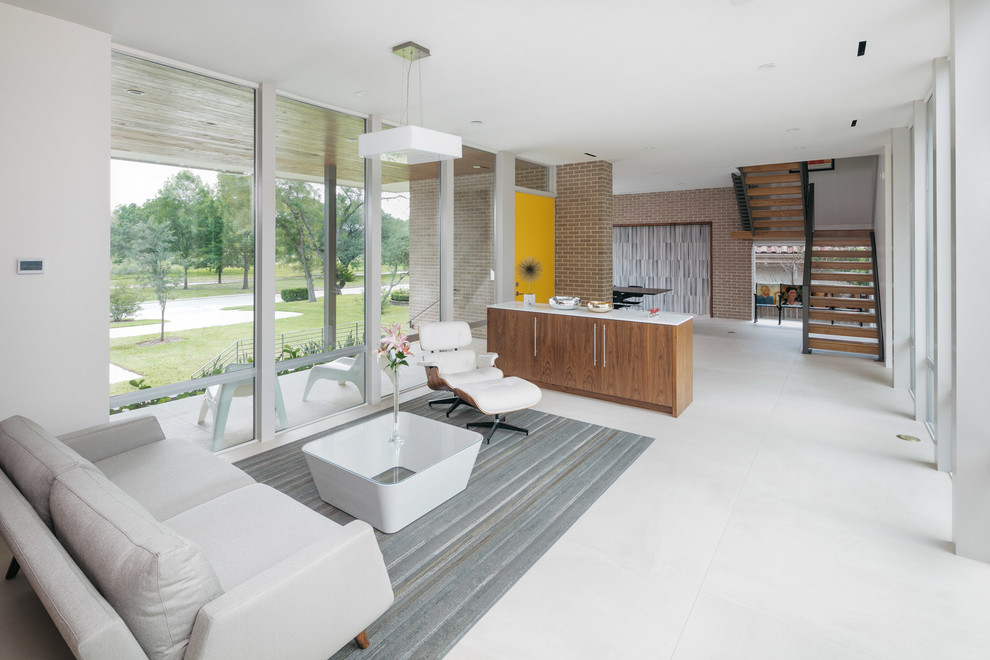 Idee per un soggiorno moderno di medie dimensioni e aperto con pareti bianche, pavimento in gres porcellanato e pavimento bianco