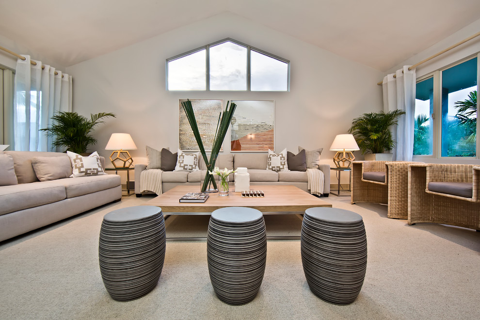 This is an example of an expansive contemporary living room in Other with white walls.
