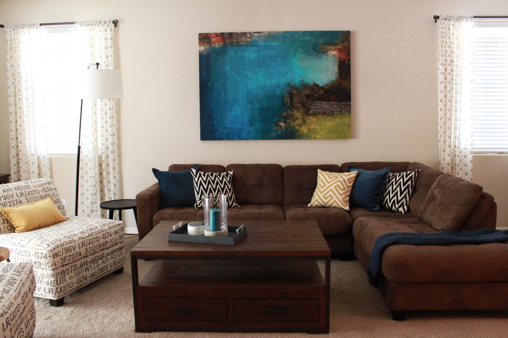 Mid-sized eclectic enclosed carpeted living room photo in Phoenix with beige walls and no fireplace