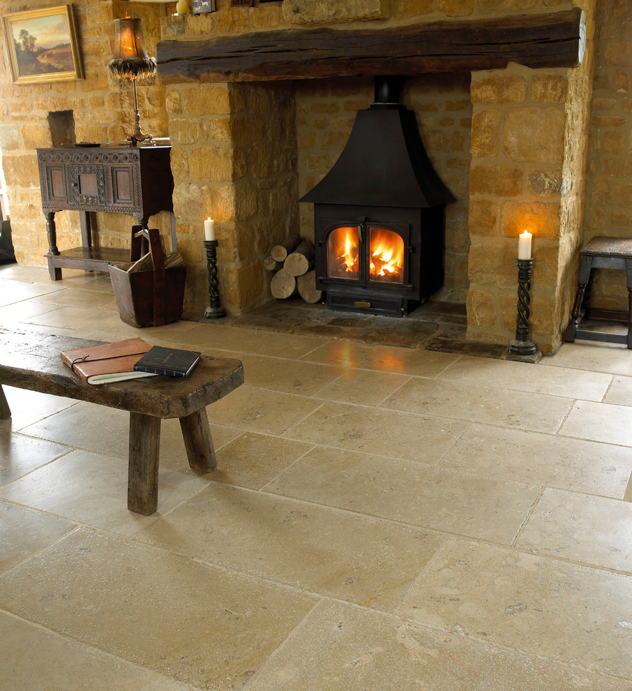 Photo of a traditional living room in Other with limestone flooring.