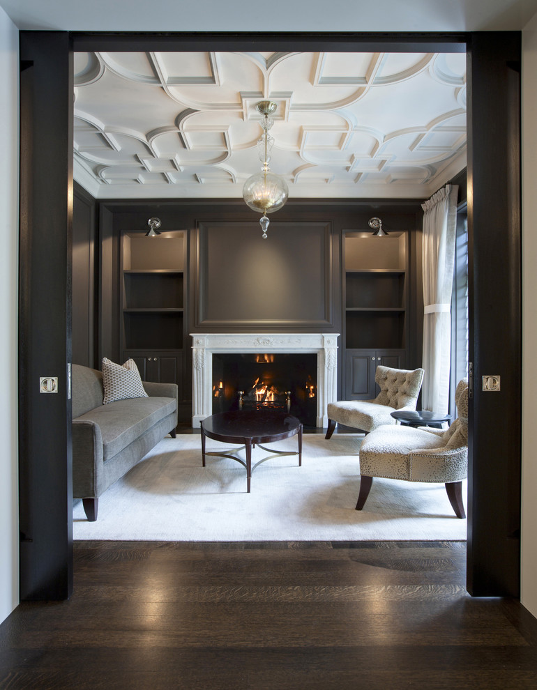Elegant formal and enclosed dark wood floor living room photo in Chicago with gray walls, no tv and a standard fireplace