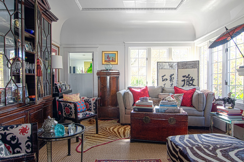 Example of an eclectic enclosed living room design in San Francisco with white walls