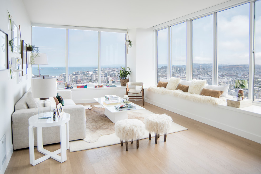 Medium sized scandi formal open plan living room in Miami with white walls, light hardwood flooring, no fireplace, no tv and beige floors.