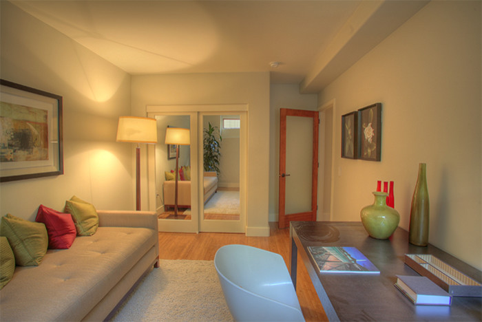 Photo of a medium sized modern living room in San Francisco with medium hardwood flooring.