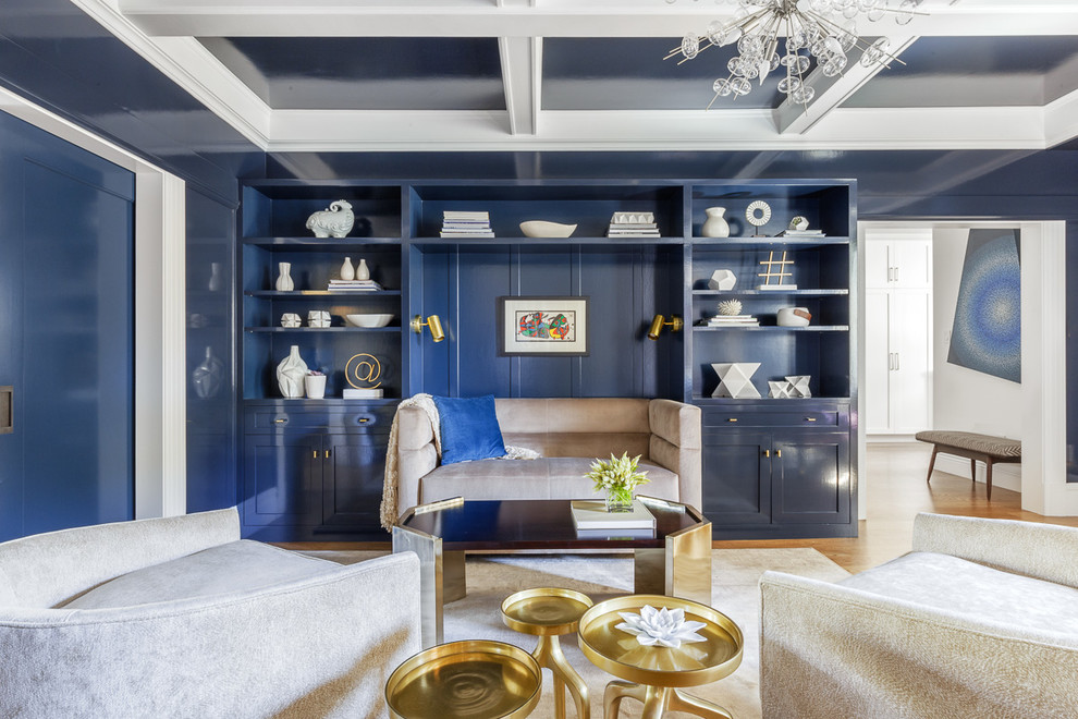 Inspiration för mellanstora klassiska separata vardagsrum, med blå väggar, mellanmörkt trägolv och ett bibliotek