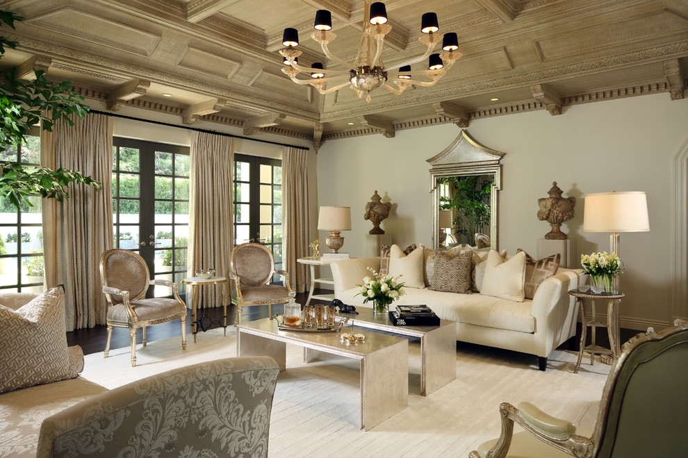 Living room - large victorian formal and enclosed dark wood floor and brown floor living room idea in Los Angeles with no fireplace, a wall-mounted tv and beige walls