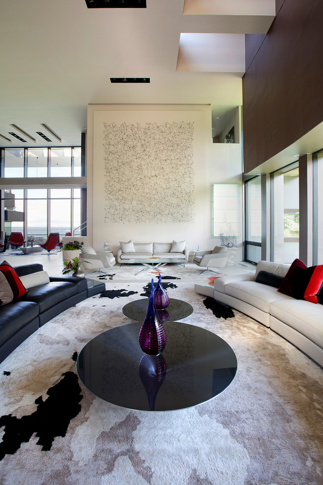 Immagine di un ampio soggiorno minimal aperto con sala formale, pareti bianche, pavimento in gres porcellanato e nessuna TV