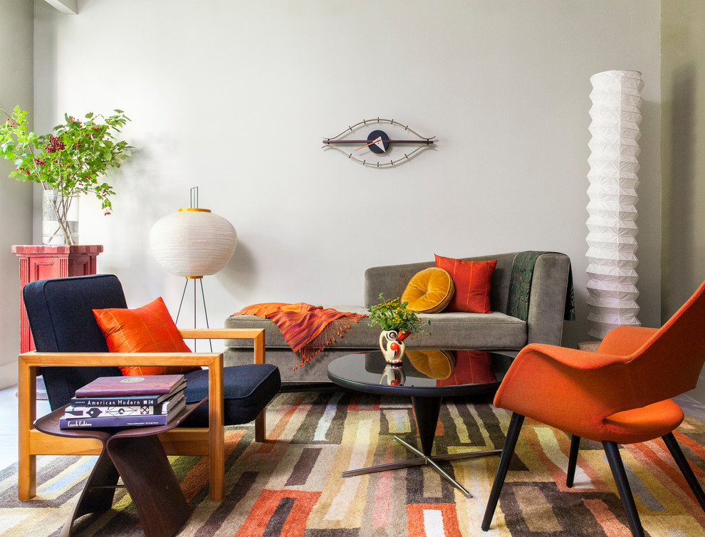 Immagine di un soggiorno minimalista di medie dimensioni e aperto con sala formale, pareti beige, moquette, nessun camino, nessuna TV e pavimento multicolore