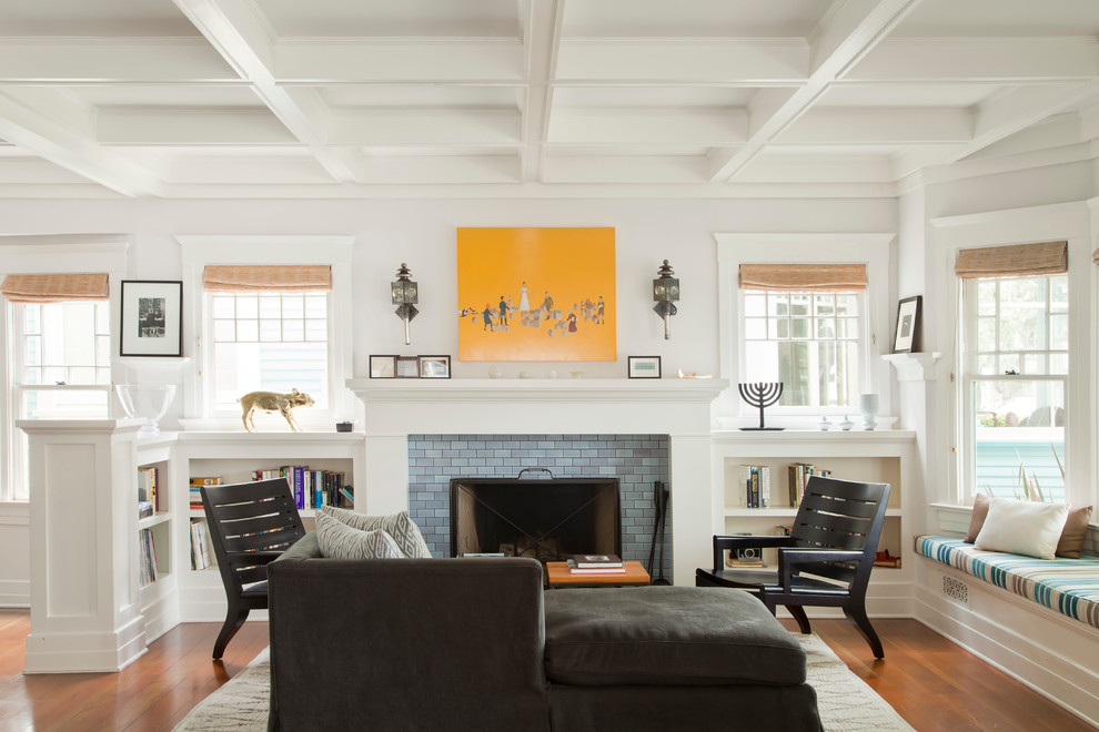 Inspiration for a coastal living room in Los Angeles with white walls, a standard fireplace and a tiled fireplace surround.