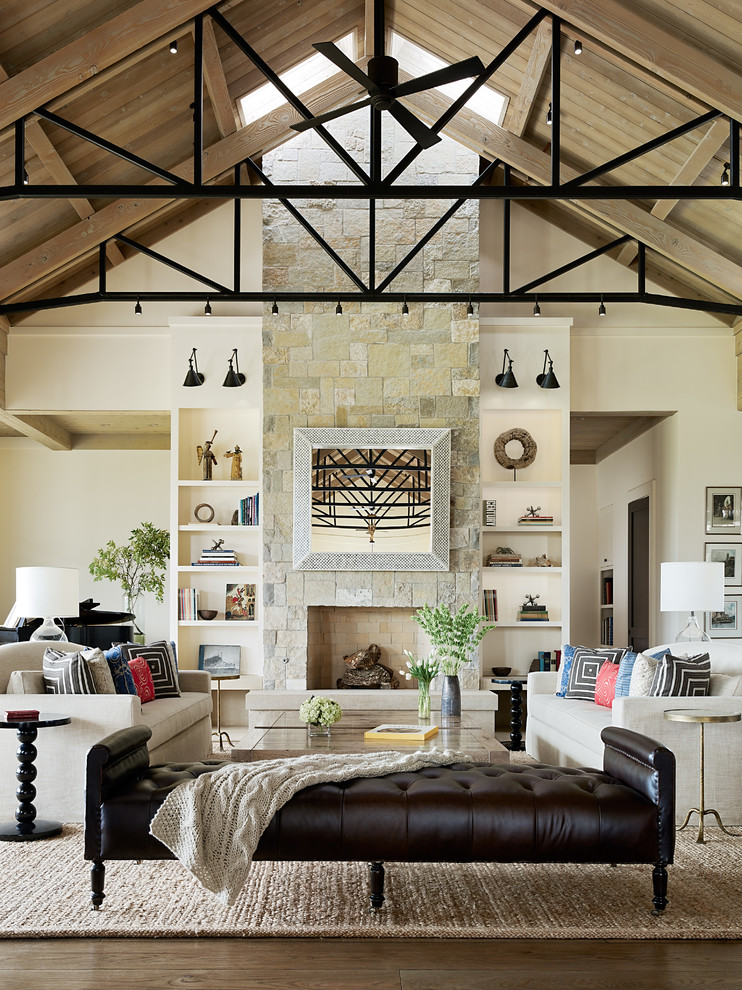 Inspiration for a transitional formal and open concept living room remodel in San Francisco with a standard fireplace and a stone fireplace