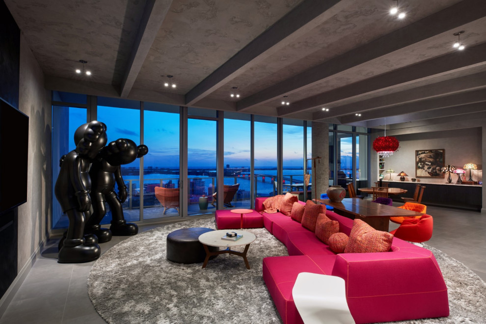 Expansive contemporary formal and grey and pink enclosed living room in Tampa with grey walls, no fireplace, a wall mounted tv, grey floors, exposed beams and panelled walls.