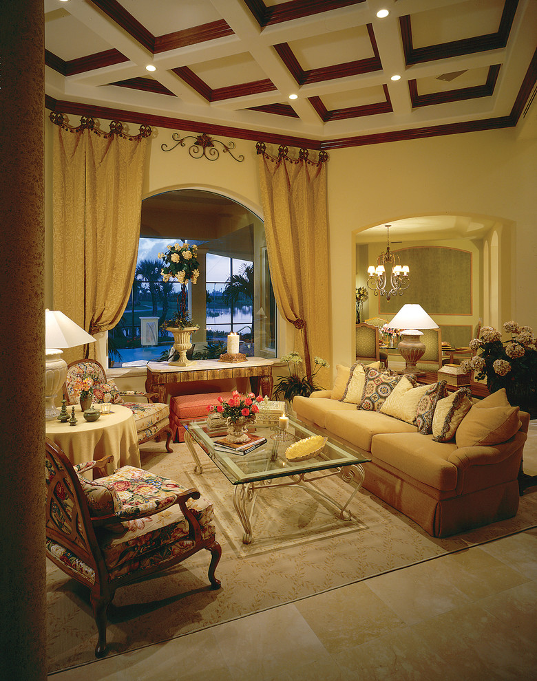 This is an example of a large mediterranean formal enclosed living room in Miami with beige walls, travertine flooring, no fireplace and no tv.