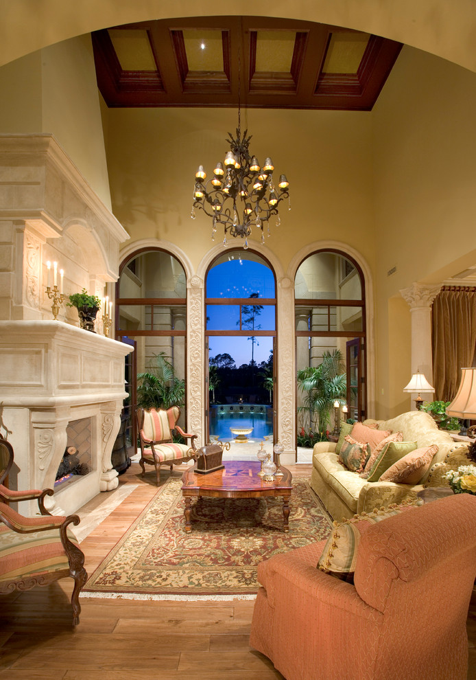This is an example of a large mediterranean living room in Miami with beige walls.