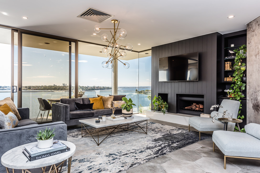 Modernes Wohnzimmer mit Kamin, TV-Wand und grauem Boden in Perth