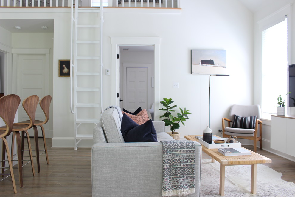Design ideas for a scandinavian living room in Toronto.
