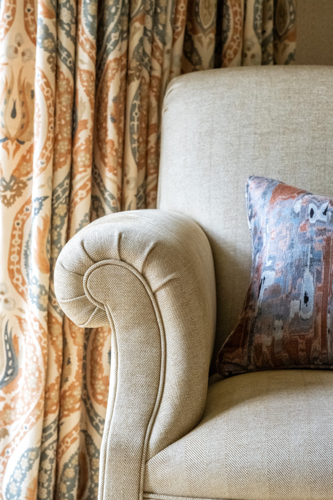 Living room - traditional formal and enclosed carpeted and white floor living room idea in Edinburgh with orange walls, a standard fireplace and a wood fireplace surround