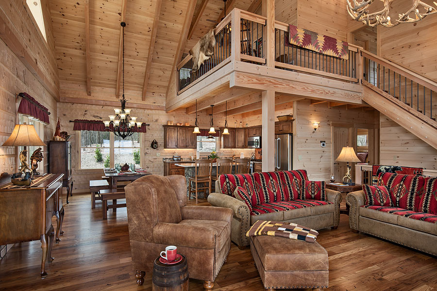 This is an example of a large rustic open plan living room in Charlotte.