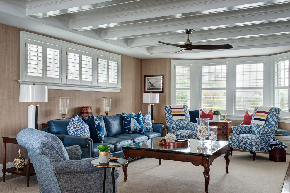 Inspiration for a coastal formal enclosed living room in Philadelphia with brown walls, medium hardwood flooring, no fireplace, no tv, brown floors, exposed beams and wallpapered walls.