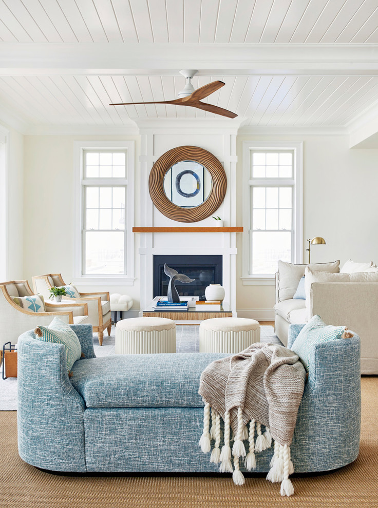 Design ideas for a nautical formal open plan living room in New York with white walls, a standard fireplace and no tv.