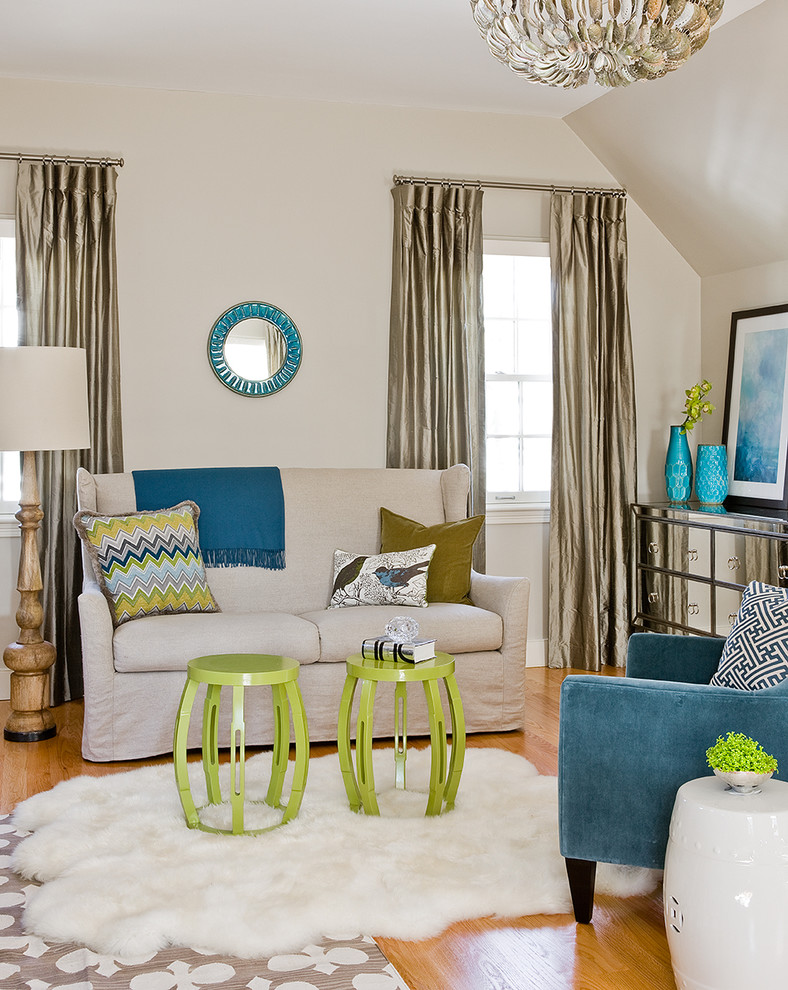 Photo of a traditional grey and teal living room in Boston with beige walls, medium hardwood flooring, no fireplace and no tv.