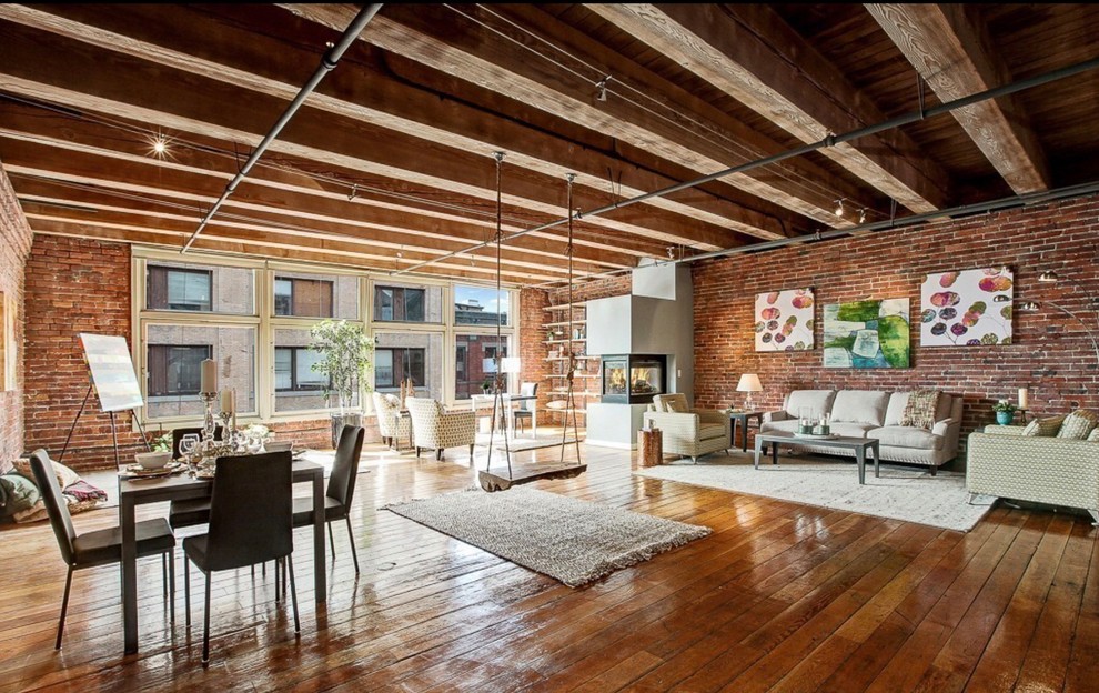 Living room - industrial living room idea in Seattle