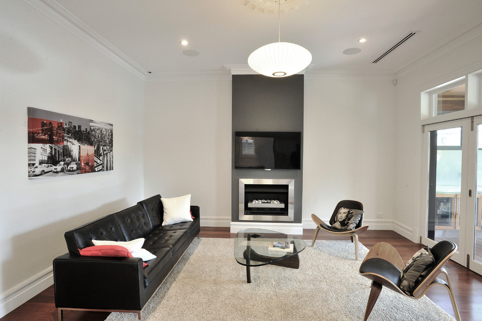 Living room - contemporary dark wood floor living room idea in Perth with white walls, a standard fireplace, a metal fireplace and a wall-mounted tv