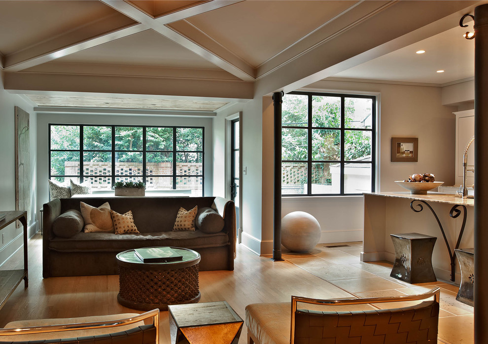 На фото: маленькая гостиная комната в стиле модернизм с бетонным полом для на участке и в саду с