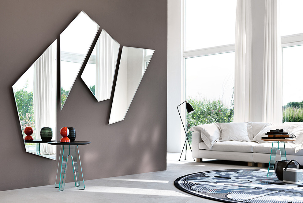 Идея дизайна: большая парадная, открытая гостиная комната:: освещение в современном стиле с коричневыми стенами и бетонным полом
