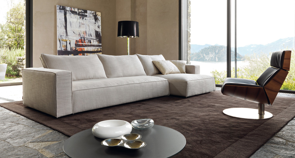 Immagine di un grande soggiorno contemporaneo chiuso con sala formale, pareti beige e pavimento in pietra calcarea