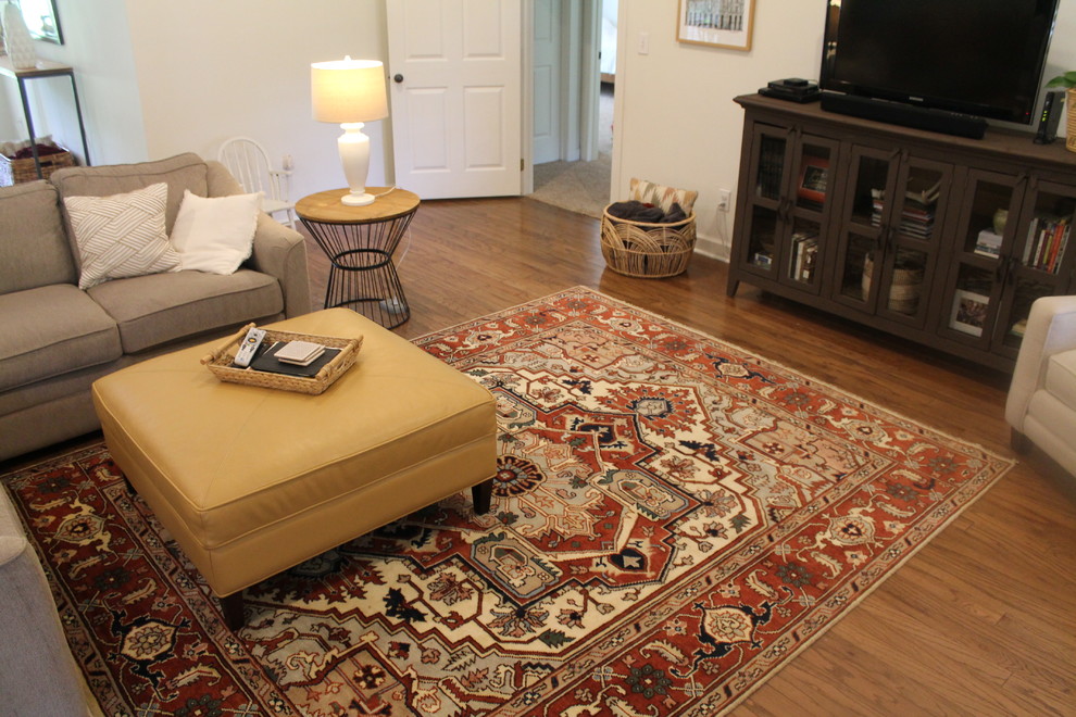 Serapi Oriental Rug lays a firm foundation for this living room space! Traditional Living