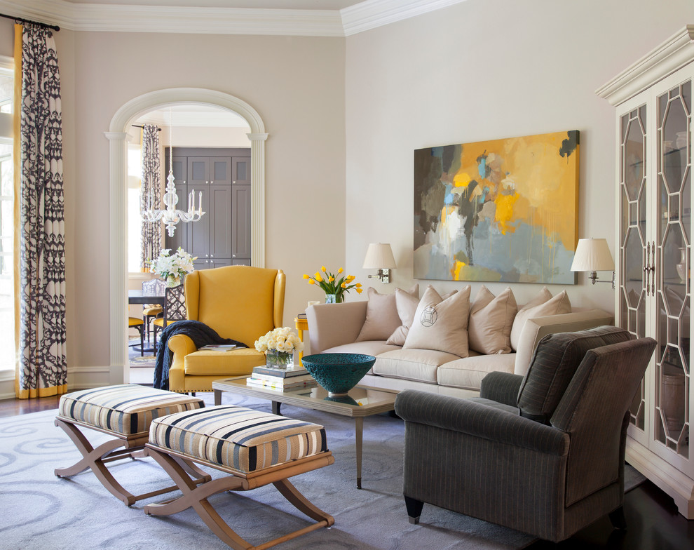 Inspiration for a large transitional enclosed dark wood floor living room remodel in Little Rock with beige walls and a media wall