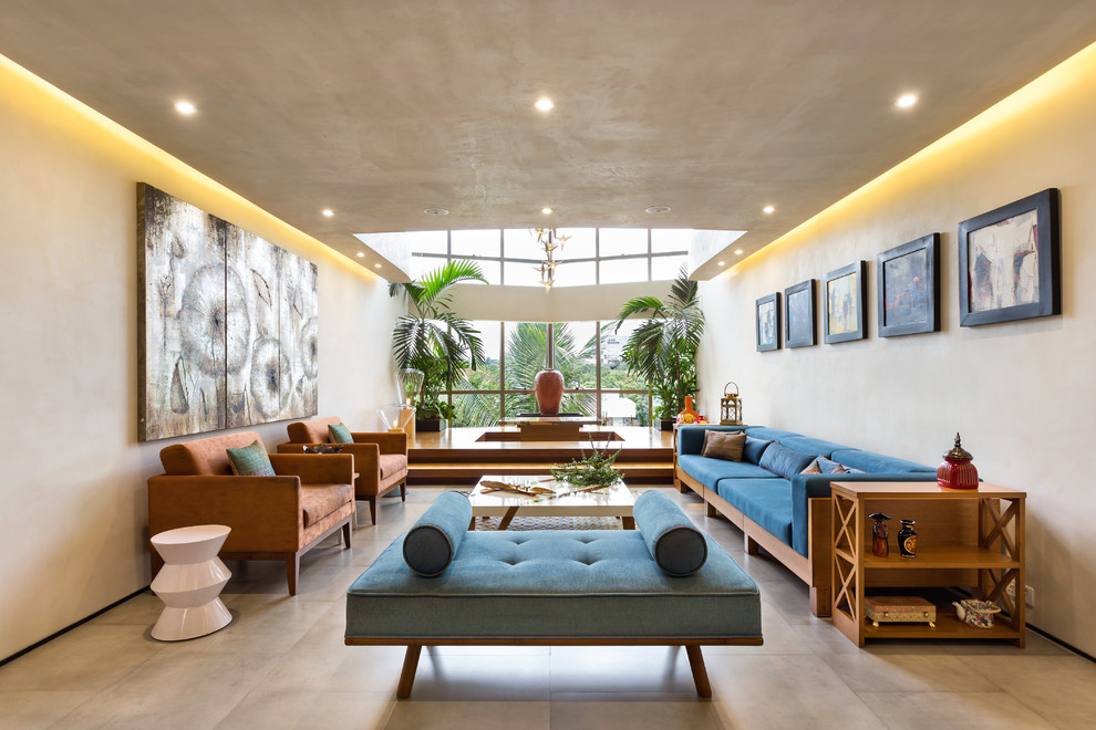 Living room - contemporary formal living room idea in Bengaluru with beige walls and no fireplace