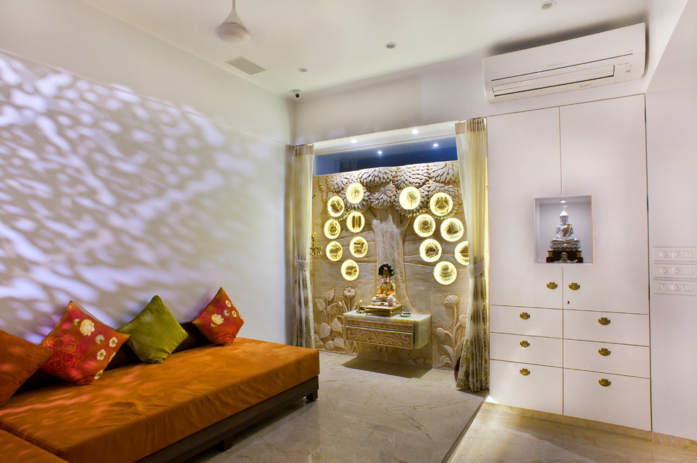 Example of a trendy family room design in Mumbai