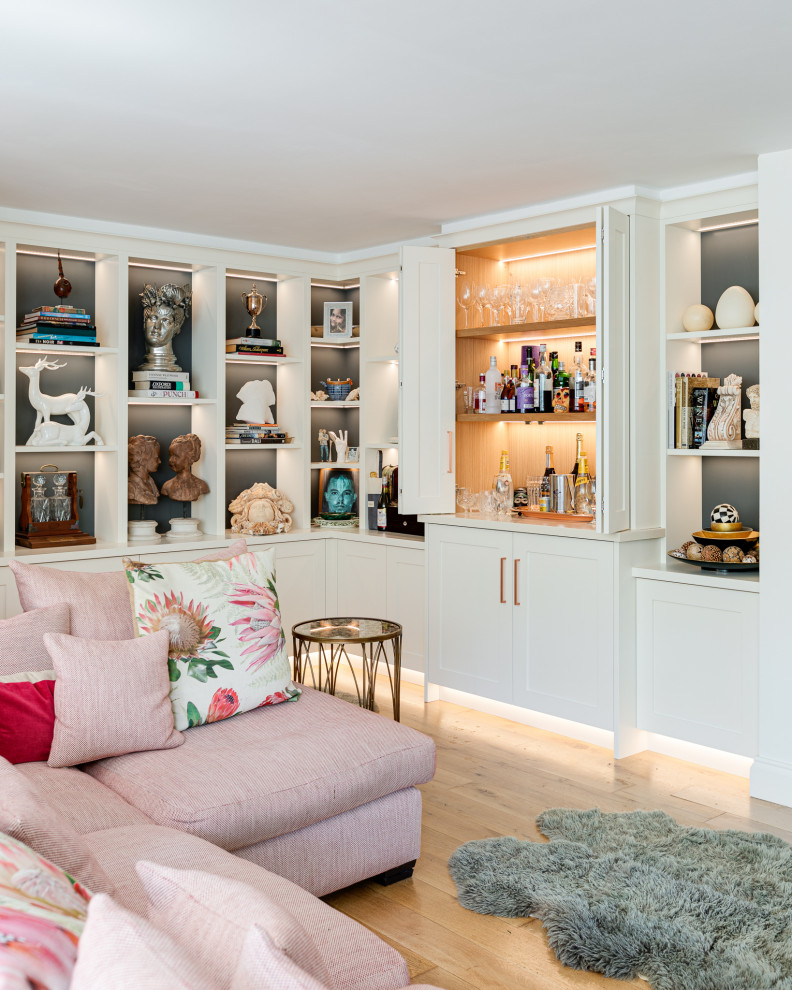 Design ideas for a large traditional formal open plan living room in Hertfordshire with a built-in media unit.