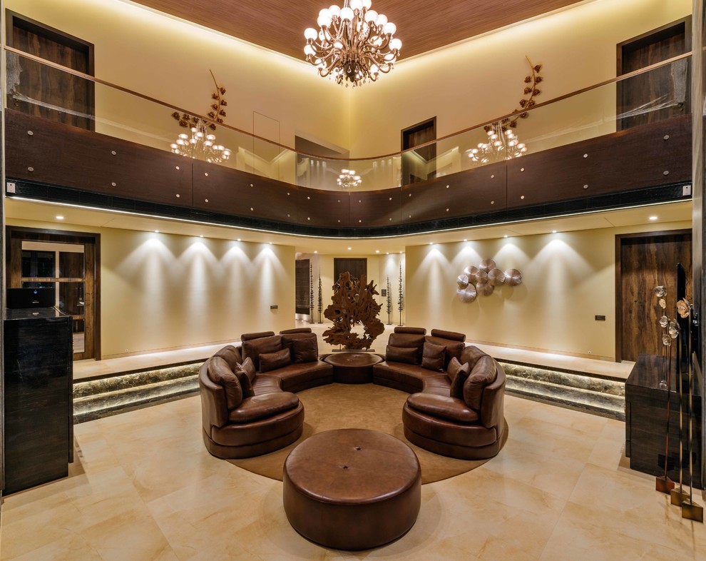 Large traditional living room in Mumbai with feature lighting.