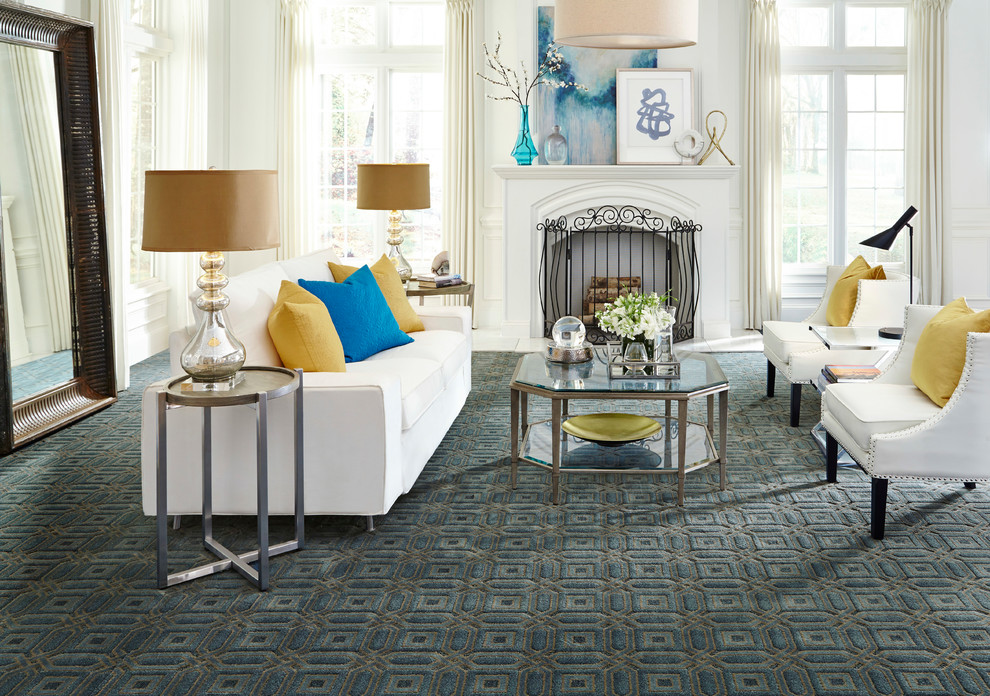 Inspiration pour un salon design avec une salle de réception, un mur blanc, moquette, une cheminée standard, un manteau de cheminée en bois et un sol bleu.