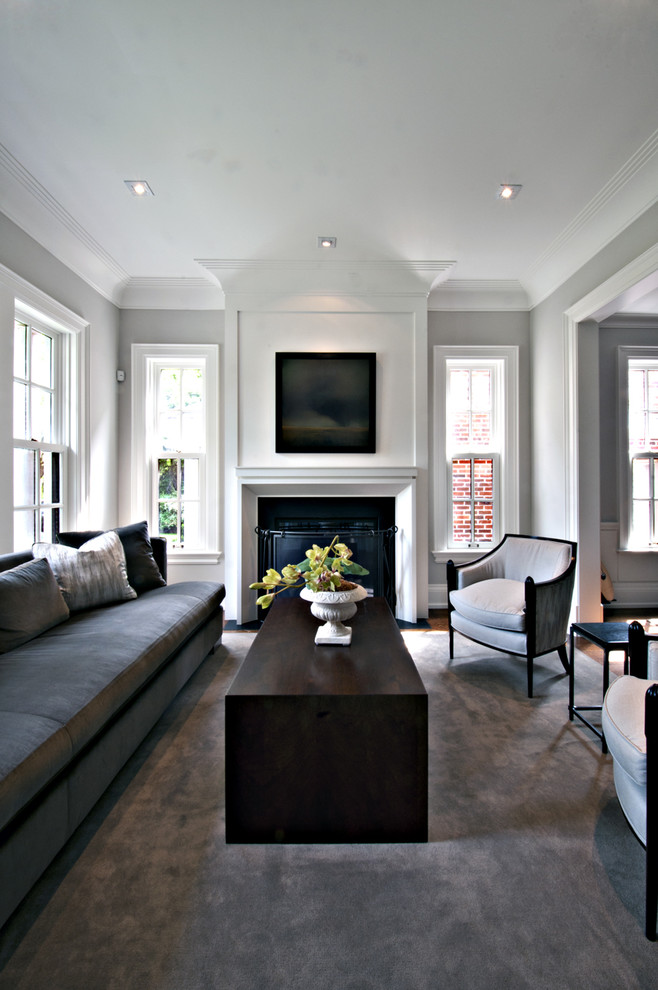 This is an example of a traditional living room in Toronto with grey walls.