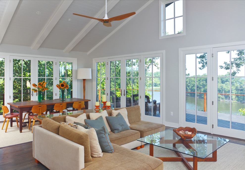 Example of a beach style formal and open concept living room design in Baltimore