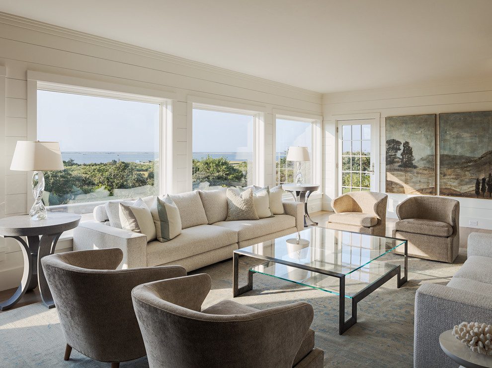 Photo of a coastal formal living room in Boston with no tv and feature lighting.