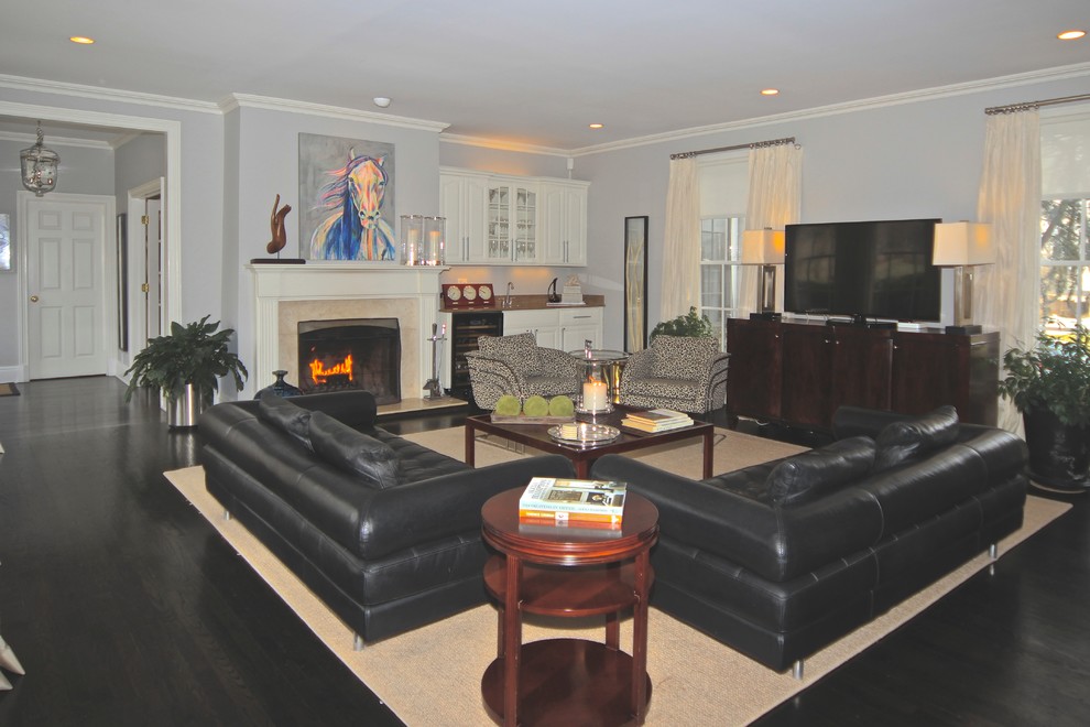 Example of an eclectic formal and open concept dark wood floor living room design in New York with gray walls, a standard fireplace, a stone fireplace and a tv stand