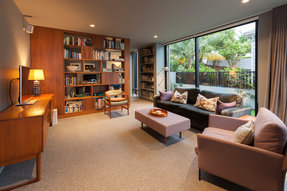 Design ideas for a medium sized modern enclosed living room in Auckland with a reading nook.